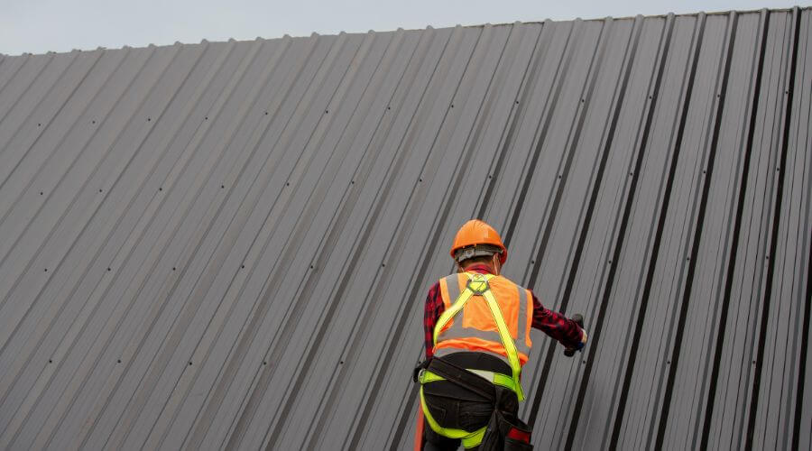 Professional metal roof installation services in Ipava, IL